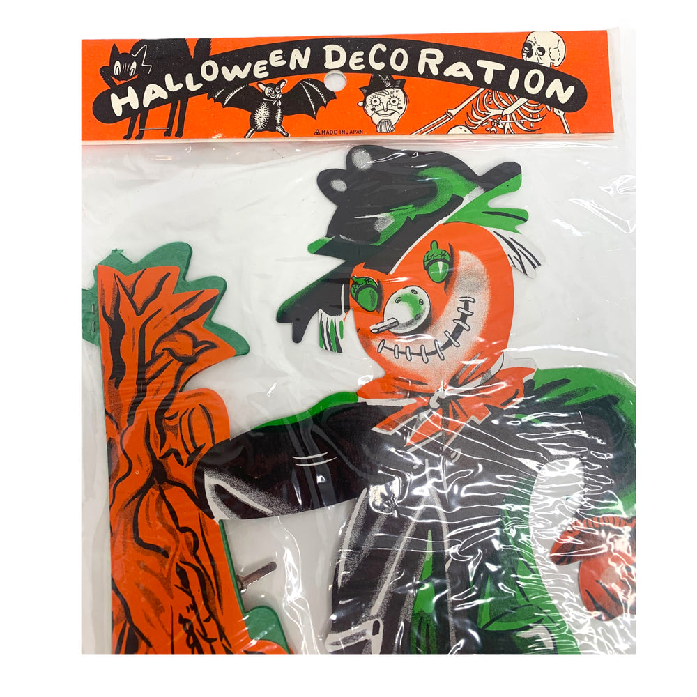 Vintage Halloween Honeycomb Scarecrow from the 1960s.