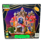 Retired Lemax Spooky Town Dark Haven Lodge #75499 - a creepy brick hotel with a red shingled roof is crawling in monsters.