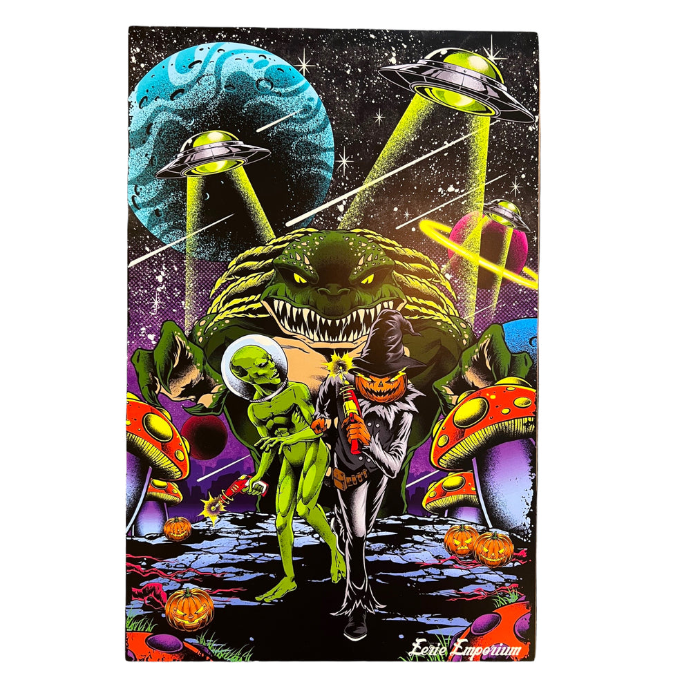 A poster of a pumpkin monster and his good friend a green alien, fight off a giant monster alien with their phaser guns. In the background are UFOs and planets. The surface of the planet they're fighting on is covered in jack o' lanterns and colorful mushrooms.