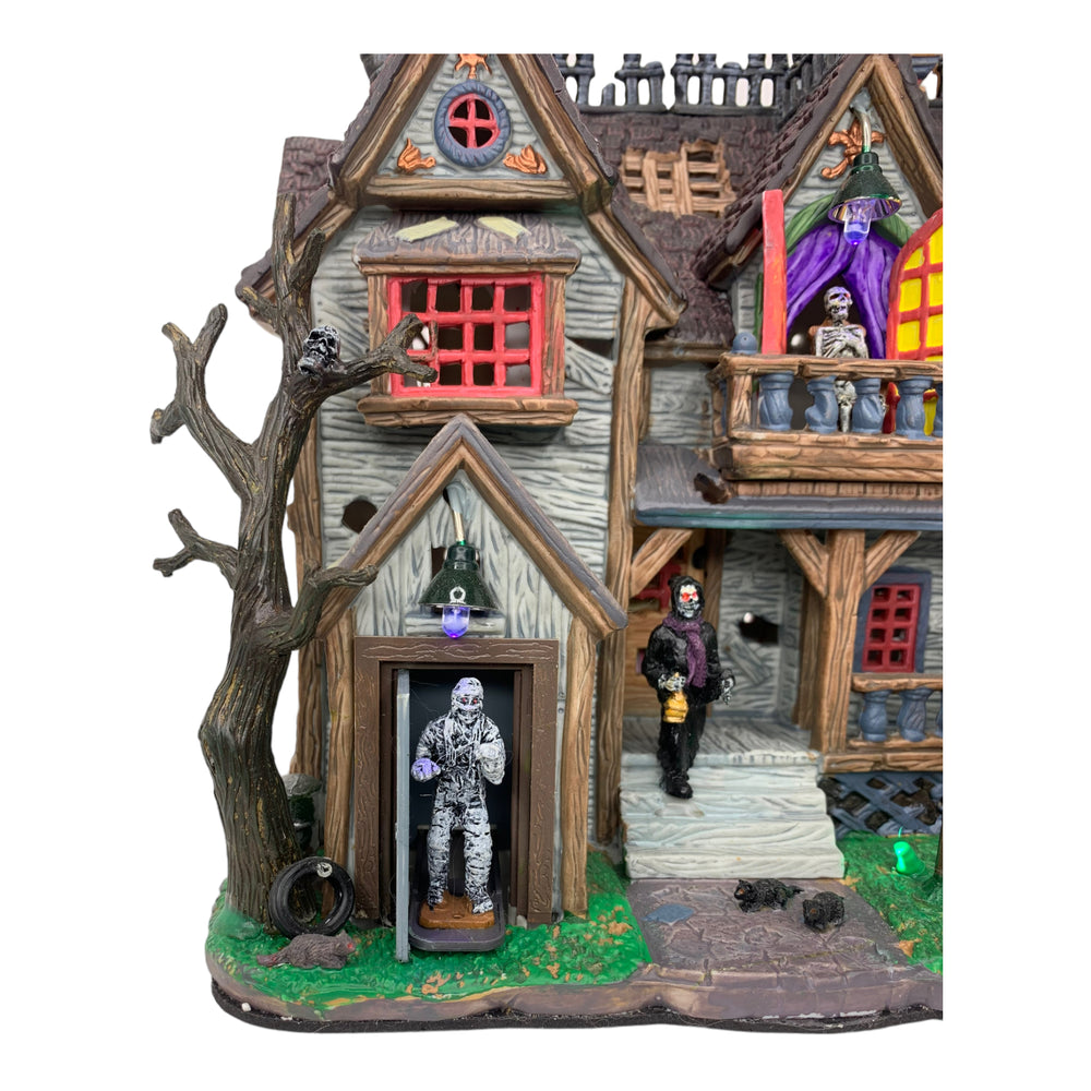 
            
                Load image into Gallery viewer, Retired Lemax Spooky Town Boogiemen&amp;#39;s Hangout #65438 - A creepy, withered house is crawling in monsters including a ghoul, a mummy, skeletons and frankenstein.
            
        